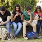 Teens Busy on Cell Phones